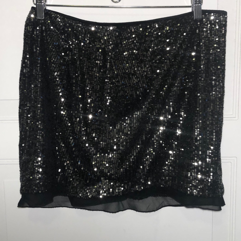 Jennifer Lopez black sequined skirt